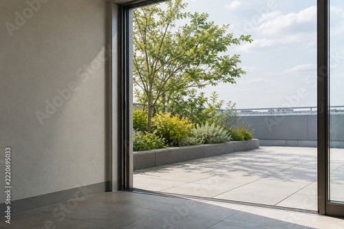 Open doorway leading to a landscaped rooftop garden terrace