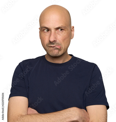 Thoughtful Bald Man looking away in doubt