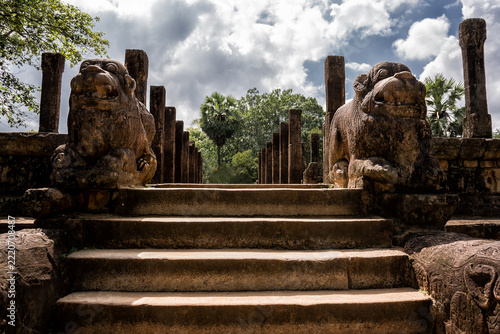 Ancient Stone Statues Guarding Majestic Temple Stairs in Polonnaruwa, Sri Lanka