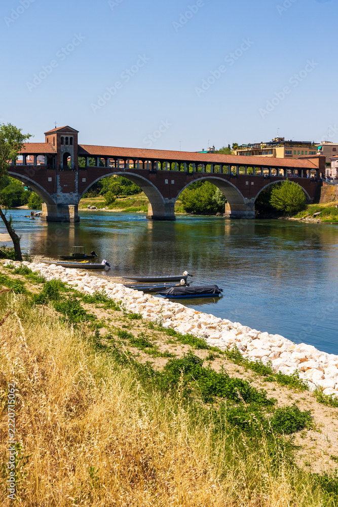 Fototapeta premium Ponte Coperto crossing the Fiume Ticino from the Ticino district in Pavia
