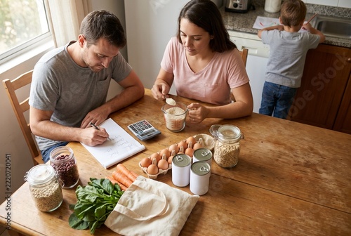 Adults planning nutritious meals with ingredients in a home kitchen