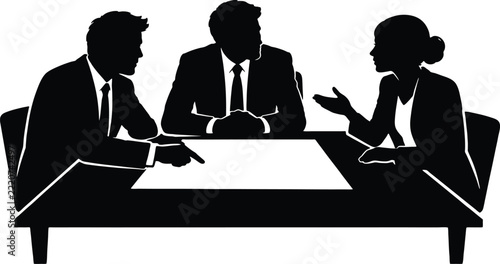 Three Executives Discuss a Planning Sheet Around a Conference Table