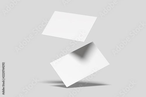 Floating Blank Business Card Mockup with Realistic Shadows on Gray Background
