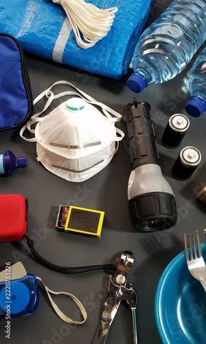Emergency kit rests on dark surface