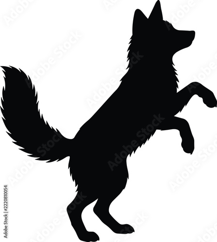 Black silhouette of a playful dog jumping or standing on hind legs vector illustration