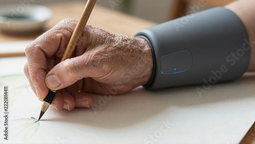 Tremor Stabilizing Wearable Smart Sleeve for Fine Motor Activities