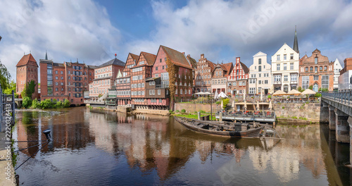 Luneburg, Germany - panoramic view of old hanseatic buildings on embankment of Ilmenau river