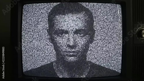 Vintage television screens showing no signal and static noise