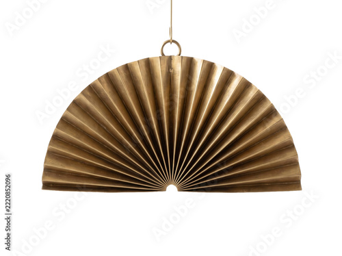 Elegant semicircular brass fan wall hanging decor isolated on a transparent background studio shot
