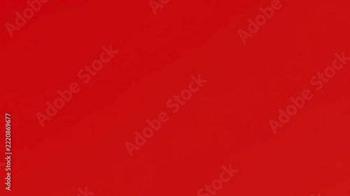 Black computer mouse cursor arrow appearing and clicking on a vibrant red background.