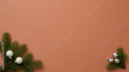 Fresh green christmas pine branches on brown wall