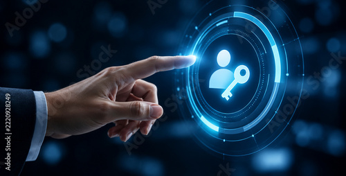 Hand Touching a Digital User and Key Symbol