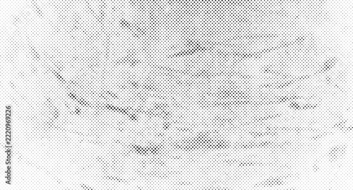 Black and white halftone texture with distressed grunge patterns, abstract dotted overlay with irregular ink splatters and grainy noise