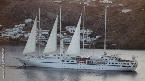 Sailing cruise yacht dropping anchor