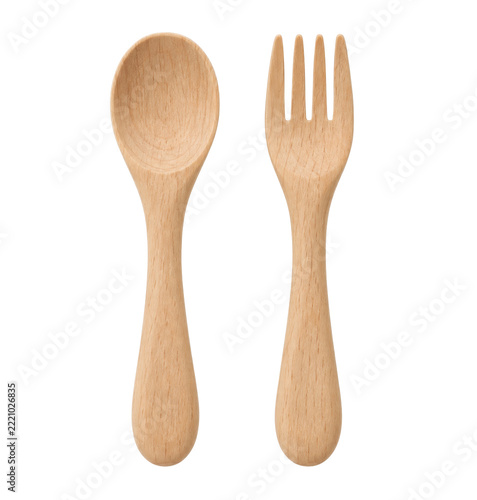 A pair of small wooden spoon and fork utensils isolated on a clean white background surface