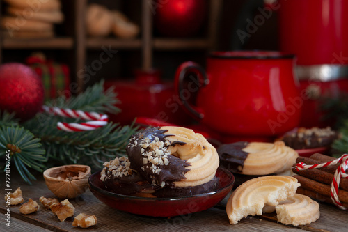 Traditional German Spritzgeback Christmas Cookies with Chocolate and Nuts
