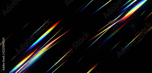 Abstract light streaks with rainbow chromatic aberration effect on black background