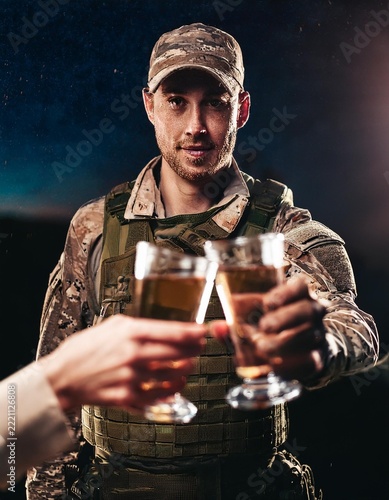 Soldiers Toasting with Drinks in Military Uniforms – Camaraderie and Brotherhood