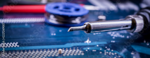 Soldering Tool on Printed Circuit Board for Electronic Component Repair and Computer Hardware Maintenance