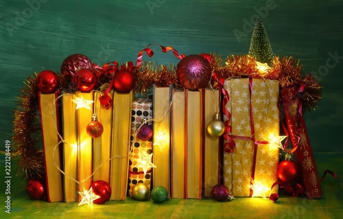 Festive Christmas Bookshelf Display with Gifts and Lights.