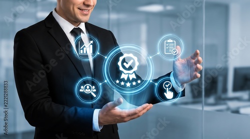 Businessman touching glowing quality assurance hologram interface in modern office