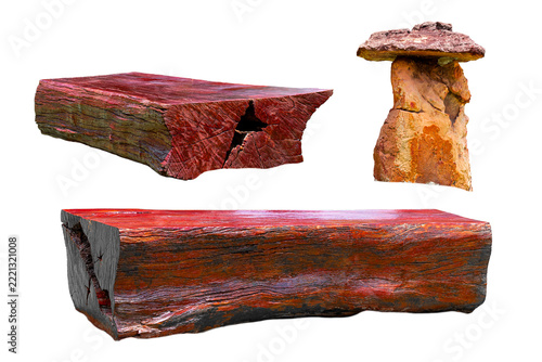 Two processed timber dark color made into bench and vertically stacked stone. Which has patterned and cracks on wood. Isolated on white background.