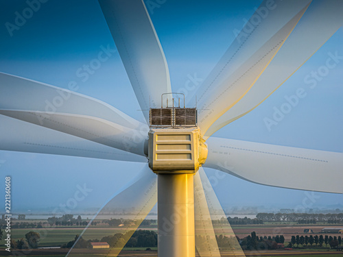 Wind turbine blades spinning for renewable energy production