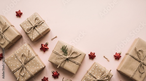 Handcrafted gift boxes wrapped with twine and decorative stars for
