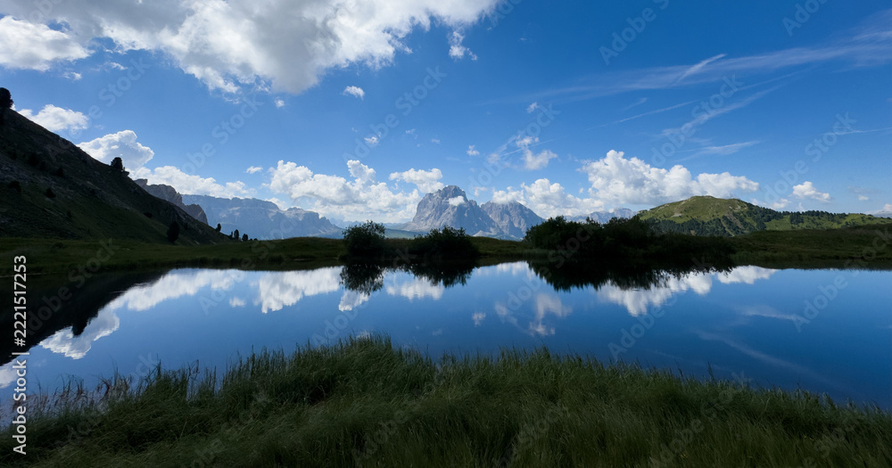 Fototapeta premium Idyllic summer landscape with clear mountain lake in the Alp 