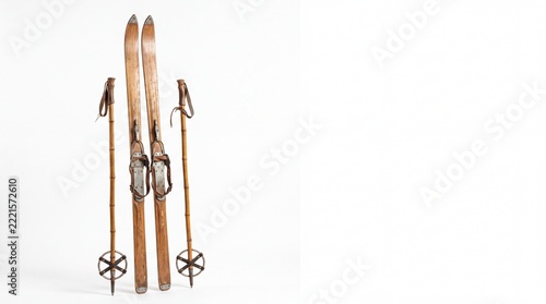 Vintage wooden skis and bamboo poles for winter sports