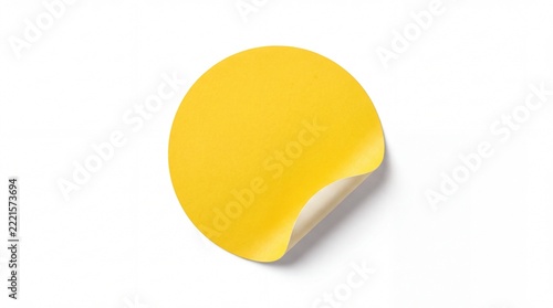 Yellow round sticker with peeling edge