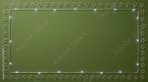 Festive Christmas garland frame on green background, decorative holiday border, illuminated string light copy space