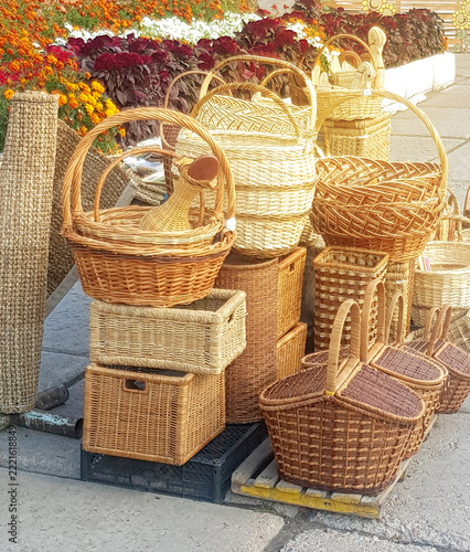 Many different wicker baskets and boxes made of natural material, close-up, the concept of eco-friendly packaging