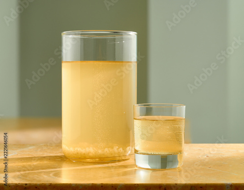Water Kefir Grains Fermenting in Glass Jar with Sparkling Drink