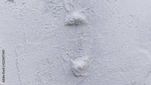 White stucco plaster wall texture background with rough uneven surface coating