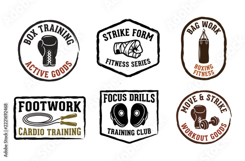Collection of retro boxing and fight training badges with gloves hand wraps heavy bag jump rope focus mitts and dumbbell in vintage stamp illustration
