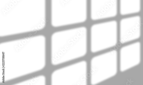 Abstract window frame shadow cast on a flat surface