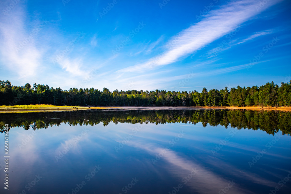 Naklejka premium Rainbow Flowage - Wisconsin River on a calm morning in northern Wisconsin