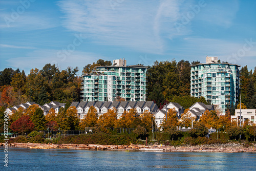 Apartments and buildings along the Fraser River in Vancouver, British Columbia