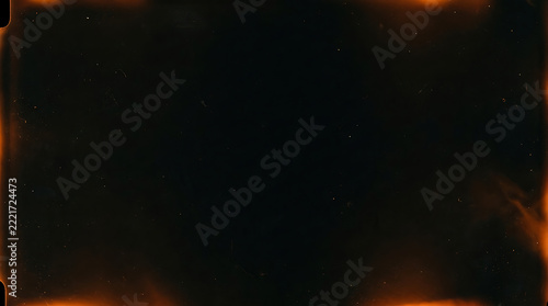 A dark square frame featuring subtle light leaks and vintage film aesthetic with warm orange glows on the edges