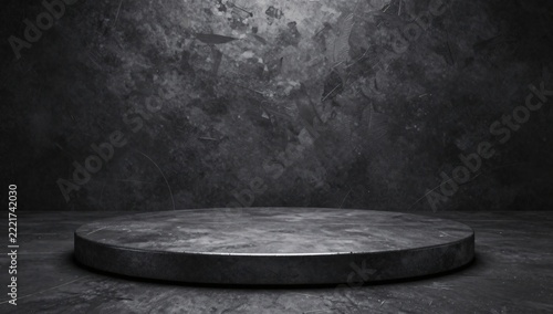 Dark concrete circular stage and textured wall background