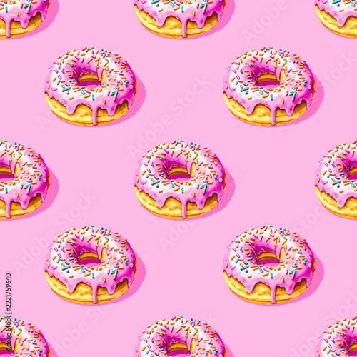 Donut seamless pattern. Watercolor pink donut with different topping on pink background. Texture for fabric, wrapping, wallpaper. Decorative print