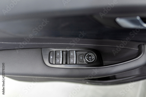 Window regulators and side mirror controls