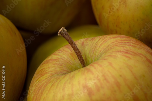 apples on a yellow background