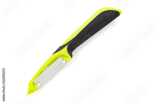 Modern vertical vegetable peeler with protective blade cover isolated on white background.