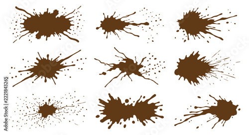 Set of brown mud splatters and dirt splashes isolated on a white background for design