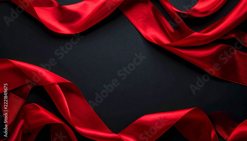 Flowing Red Ribbons Framing Black Copy Space