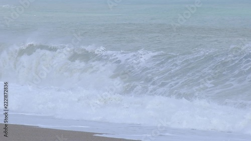 Powerful Brown Sea Waves During a Storm. Rough Muddy Sea Waves Surging in Stormy Weather. Turbulent Brown Ocean Water with Strong Waves.
