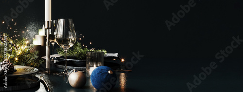 Christmas diner setup on black background. Elegant dining table top with Christmas decoration and copy space. 3D Rendering, 3D Illustration