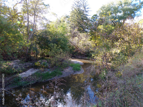 Fall landscape with colorful trees and river